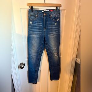 Medium wash distressed skinny jeans